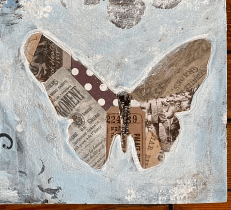Mixed-media collage butterfly artwork, the visual heart of the 5 Minute Mindfulness brand
